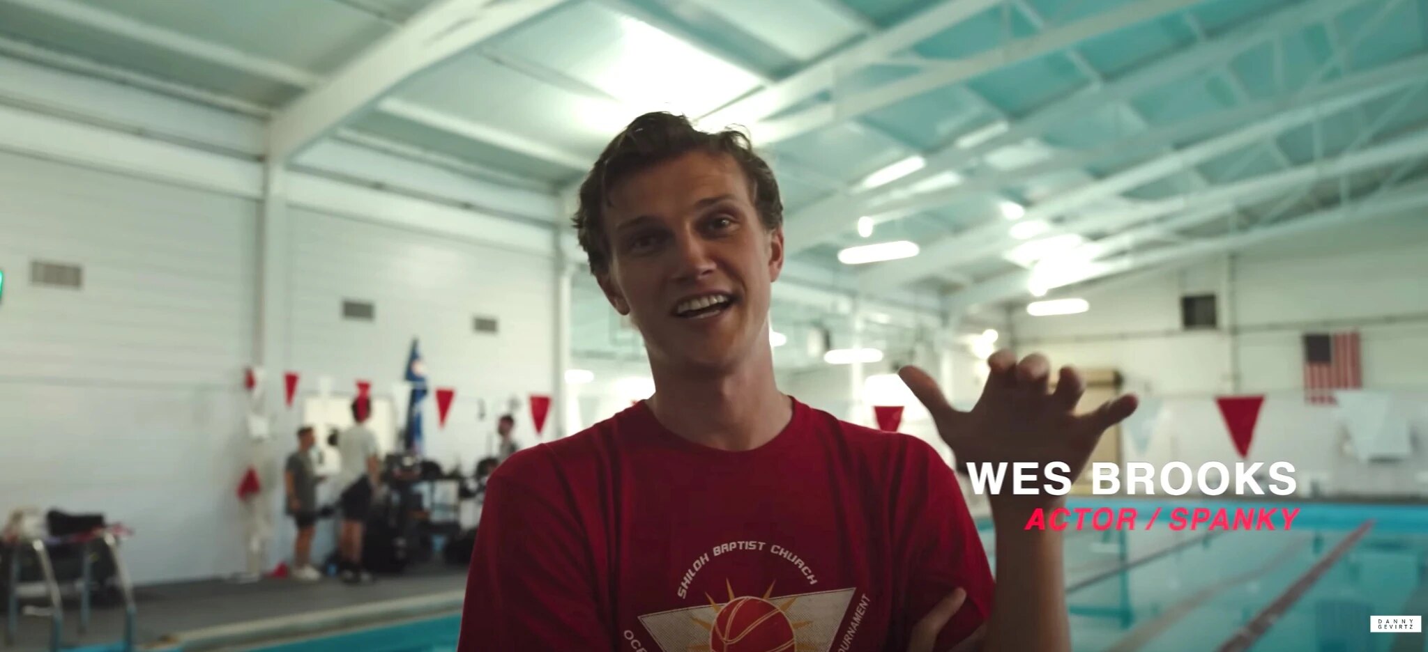 Wes Brooks interviewed beside the swimming pool