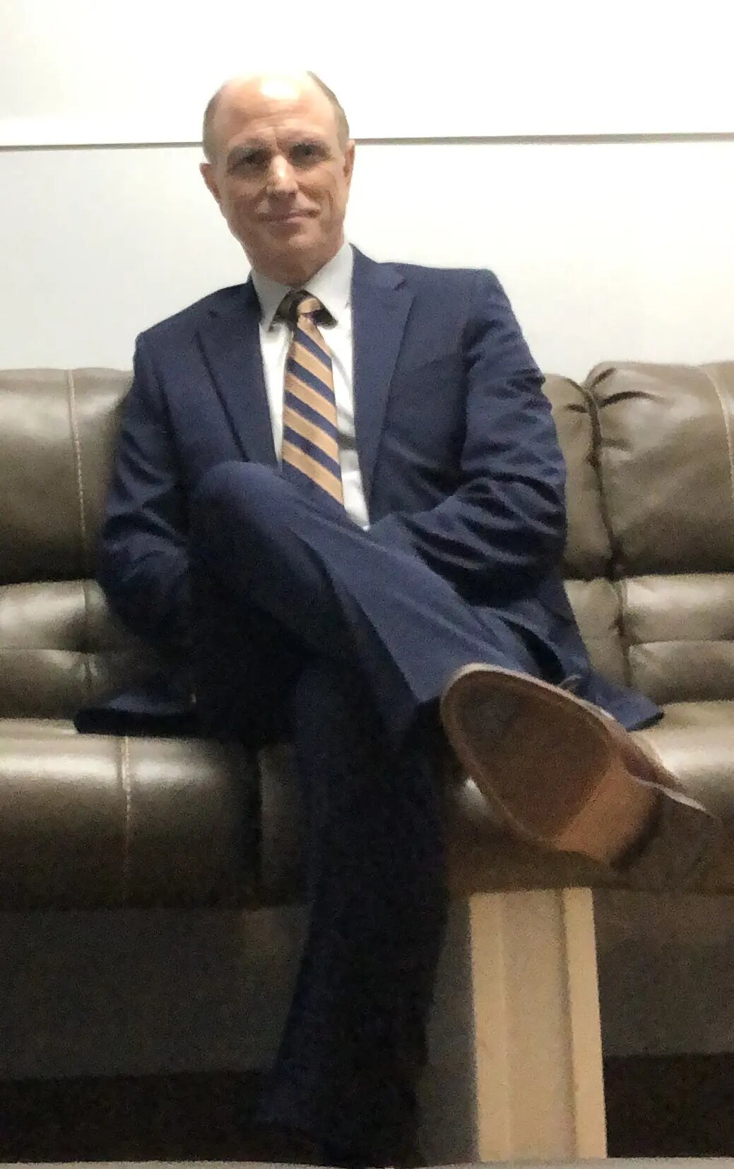 Drew Moore seated in wardrobe before shooting The Night Agent
