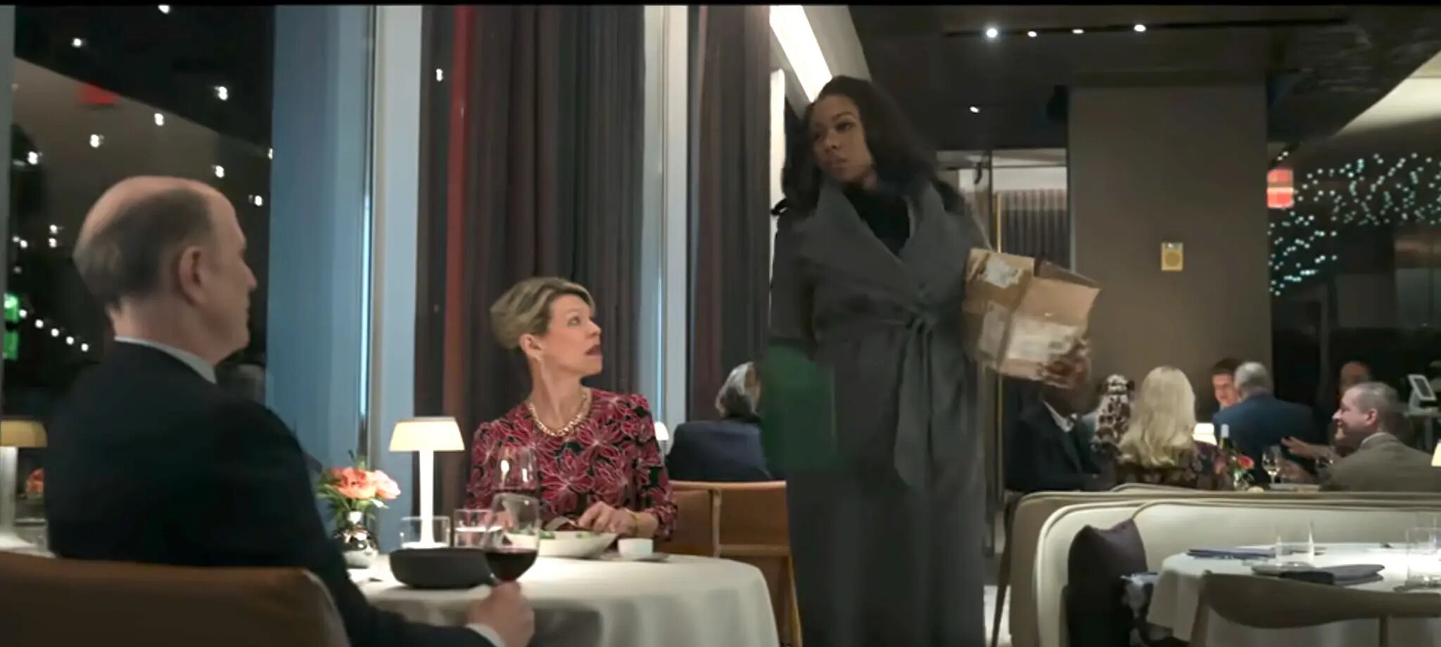 Catherine enters the restaurant as Byron Gedney sits at the table