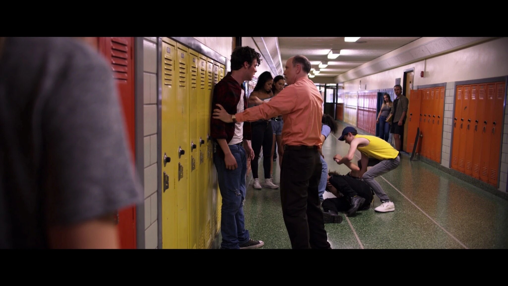 Mr. Deere intervenes in a crowded school hallway