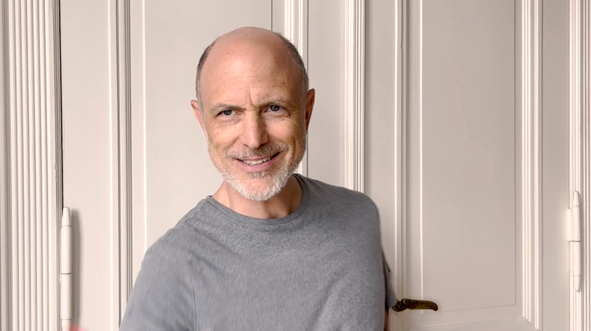 Drew Moore in a gray shirt in a still from his self-tape audition for Bosley